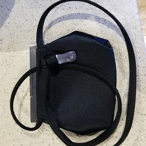 Calvin Klein sm black satin purse w/removable strap like new condition
